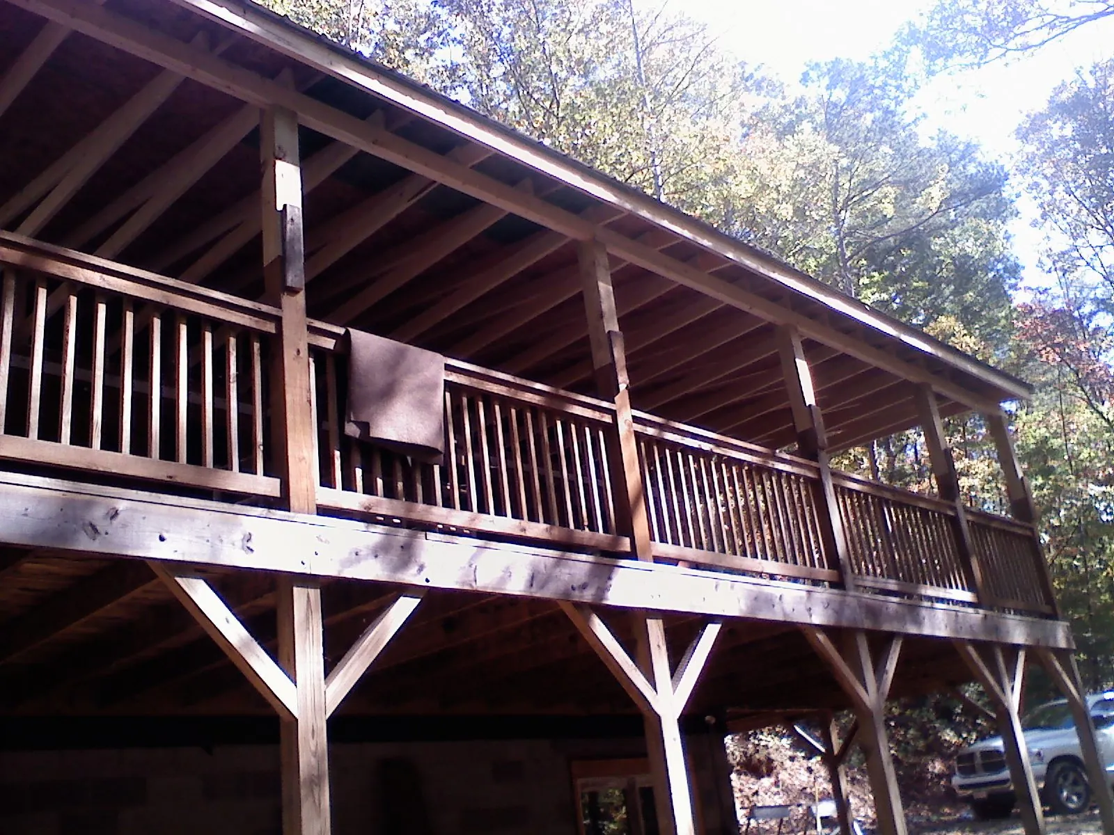Timber framing under a new elevated porch and deck — Roof Leak Repair in Rising City by Roofing Brothers